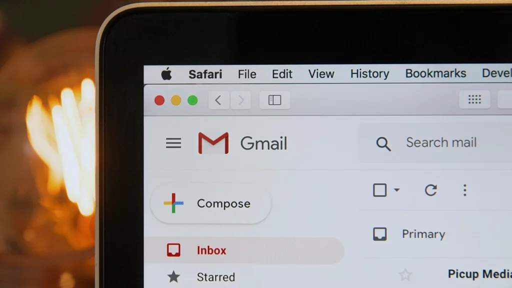 Business email compromise risk in a company email inbox on a laptop